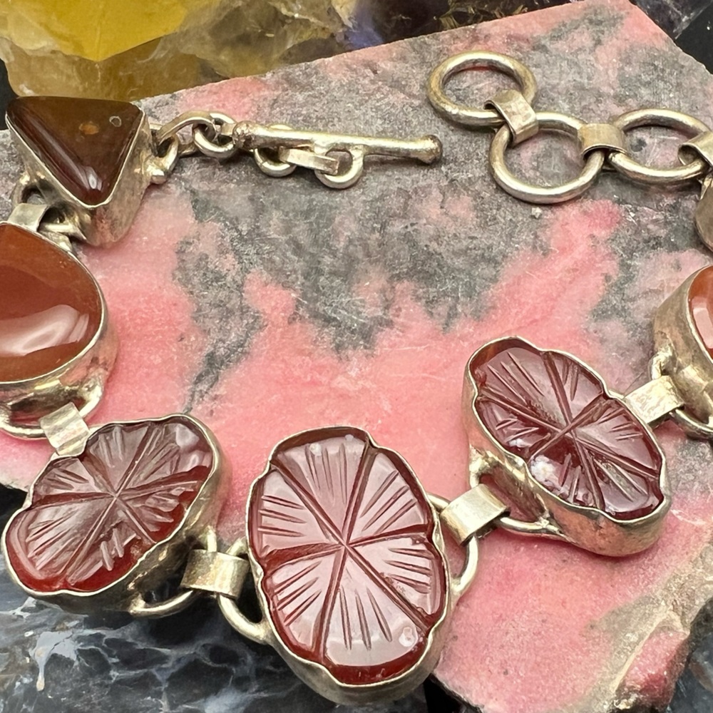 Two beautiful handmade sterling silver and semi precious stone bracelets.